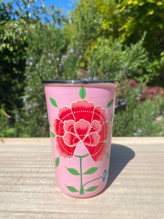 pale pink tumbler with red flower.  Enamel outer and stainless steel inside