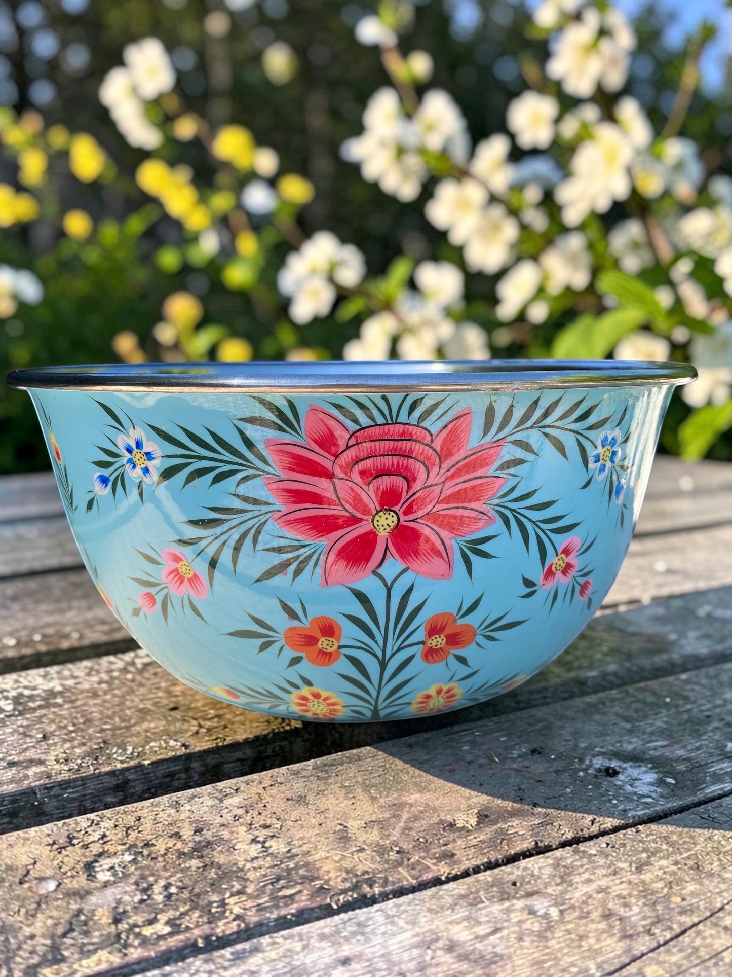 The Bamboo Bird hand-painted stainless steel and enamel bowl in light blue with floral patterns from Kashmir
