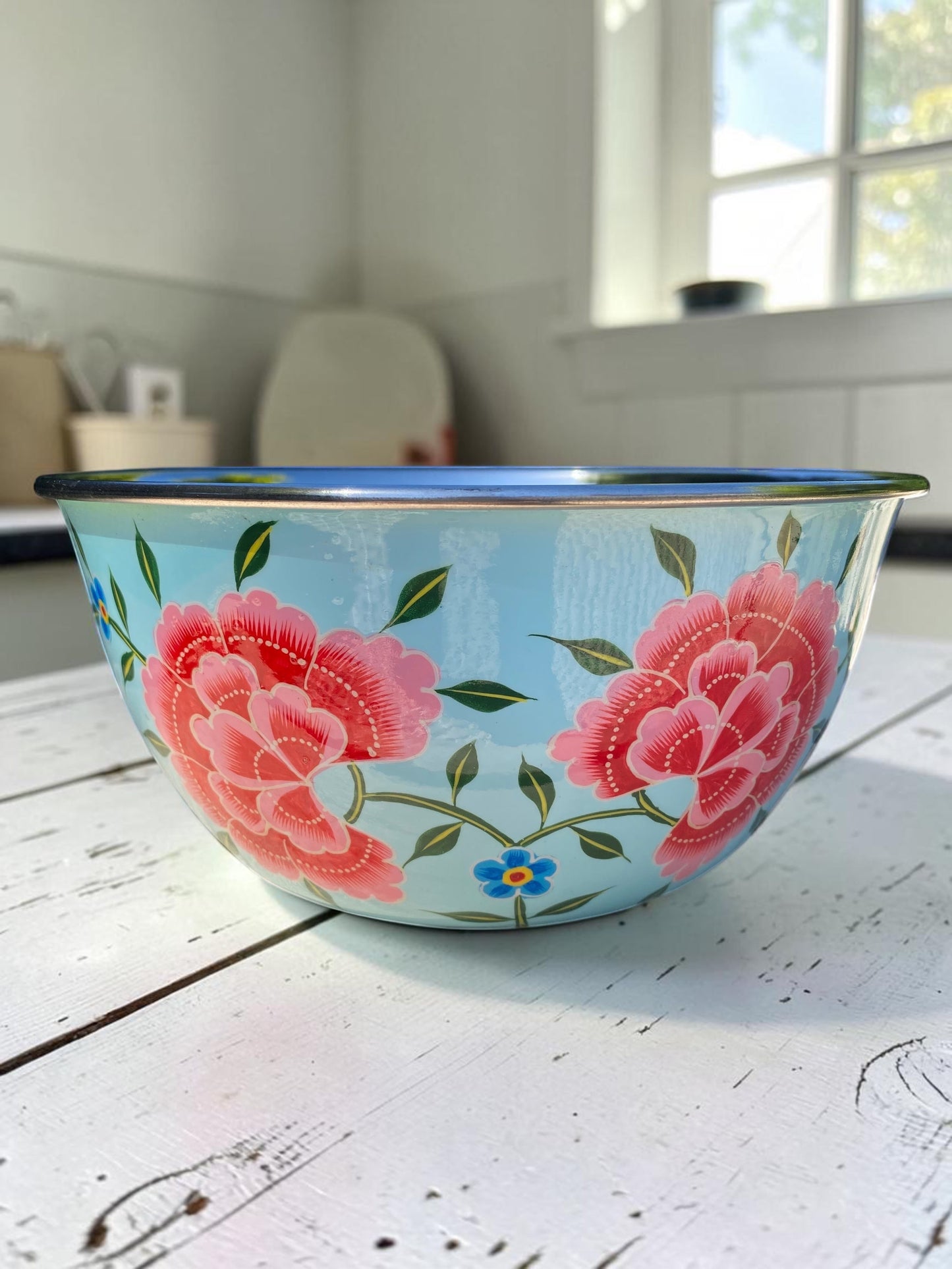 The Bamboo Bird hand-painted light blue stainless steel bowl with pink floral enamel design for serving or mixing.