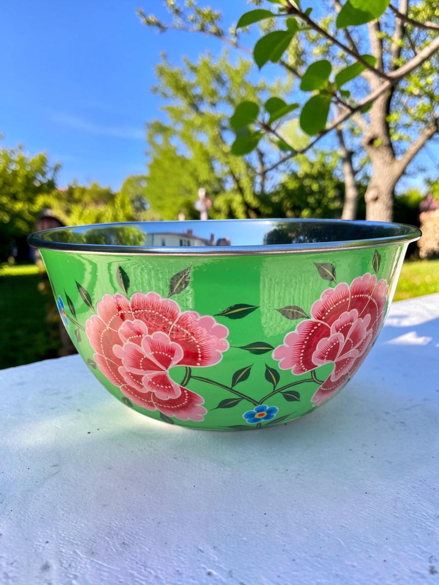The Bamboo Bird stainless steel bowl with hand-painted green enamel and pink floral design from Kashmir