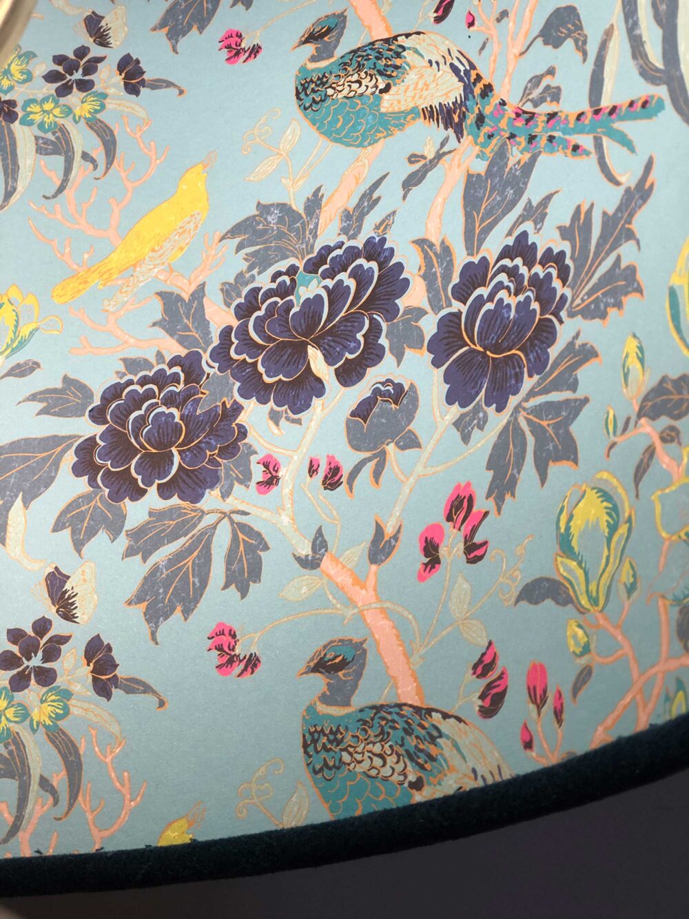 *close up of navy lampshade with matthew williamson peacock and magnolia lining