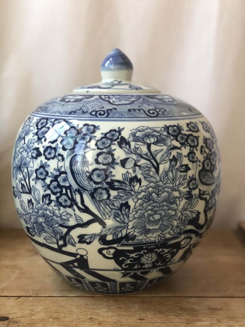 *large round blue and white chinoiserie jar with bird and peonies