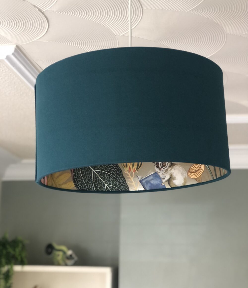 *teal linen lamshade with gold lining with toucans lemur parrots