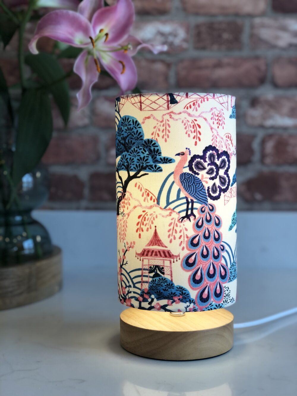 *pink and blue chinoiserie peacock and pagoda lamp with wooden base