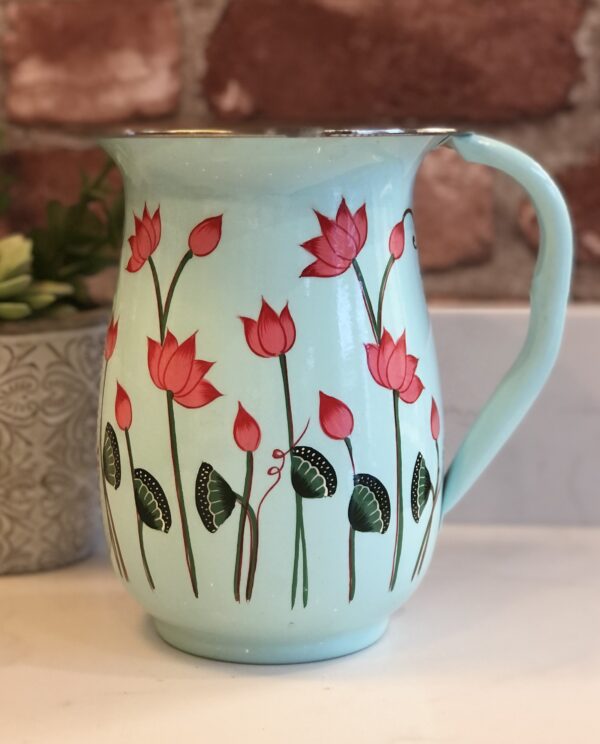 *pale mint green enamelware jug with lotus flower
